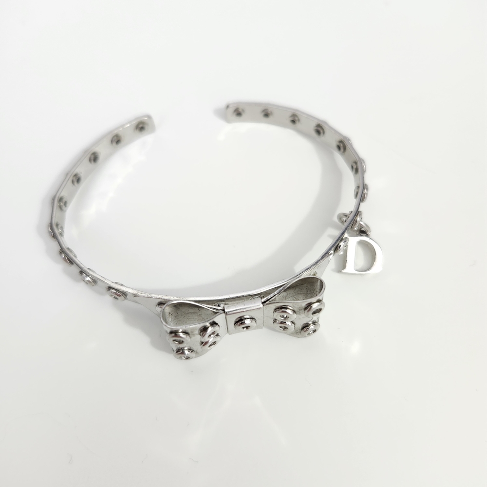 DIOR DIOR DIOR COUTURE RARE VINTAGE Silver Studded Bow Cuff DIOR Monogram